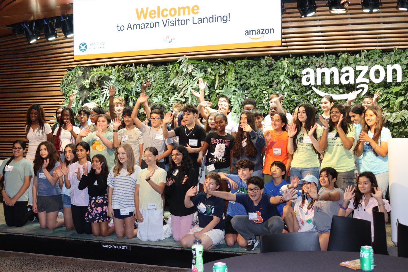 Orblynx students gathered at the Amazon visitor landing during their HQ2 visit