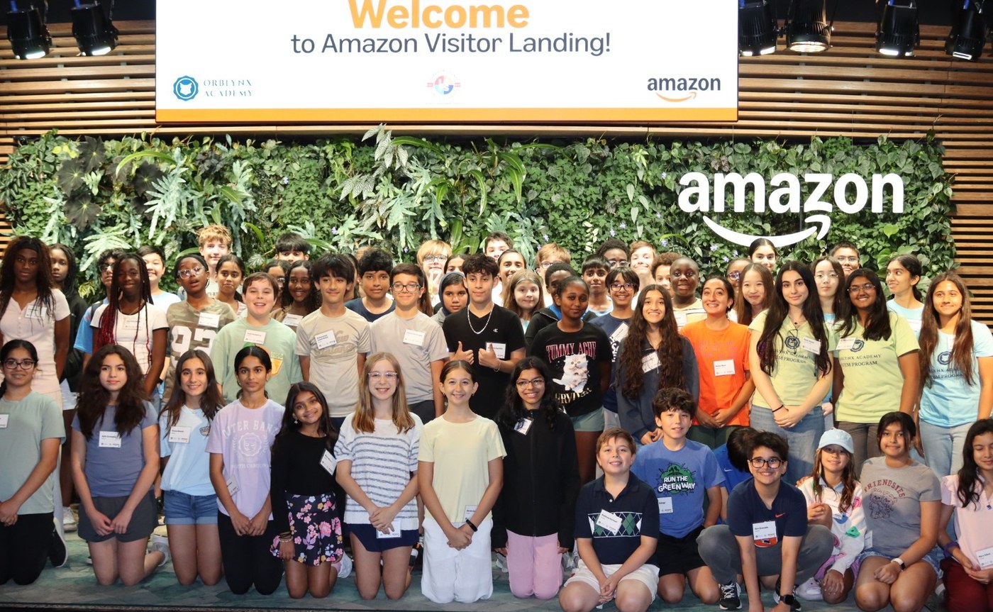 Orblynx Academy students welcomed at Amazon Visitor Landing during a partnership visit